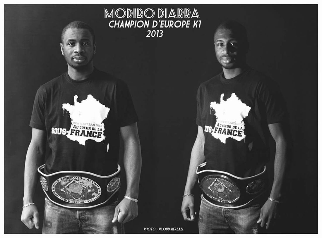 Portrait de Modibo Diarra avec sa ceinture de champion d'Europe K1 2013
